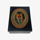 Small black soapstone box with red fox portrait on front on a white background