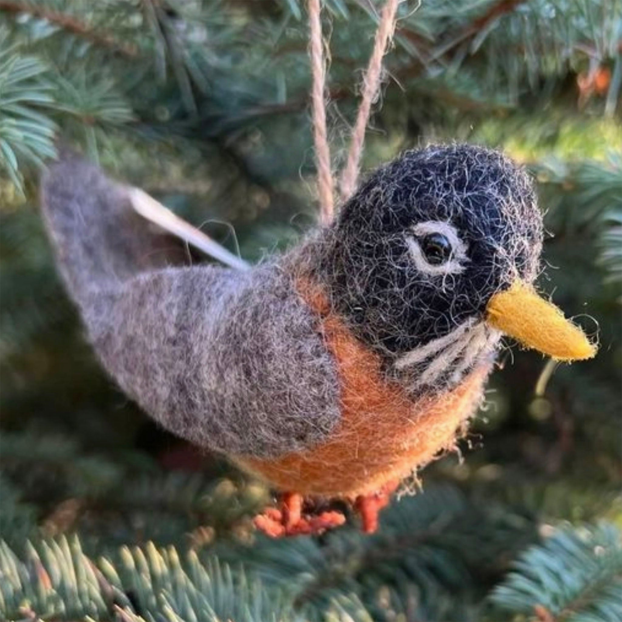 Red Robin Felt Ornament hanging on a tree