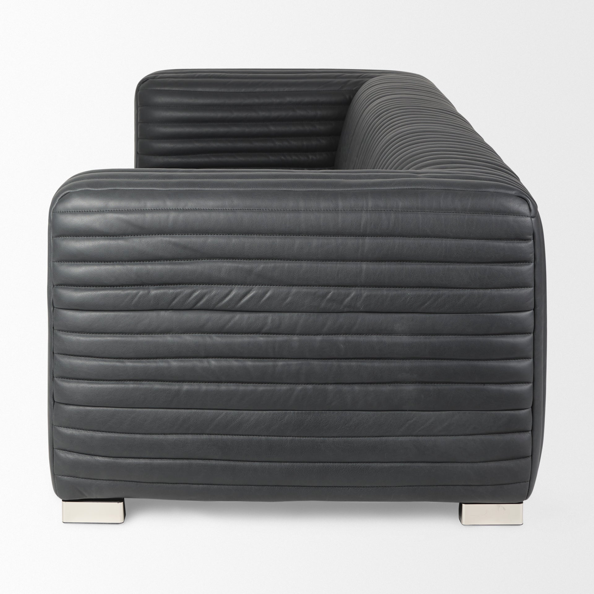 Ricciardo ribbed Black Leather Wrapped Three Seater Sofa on a white background