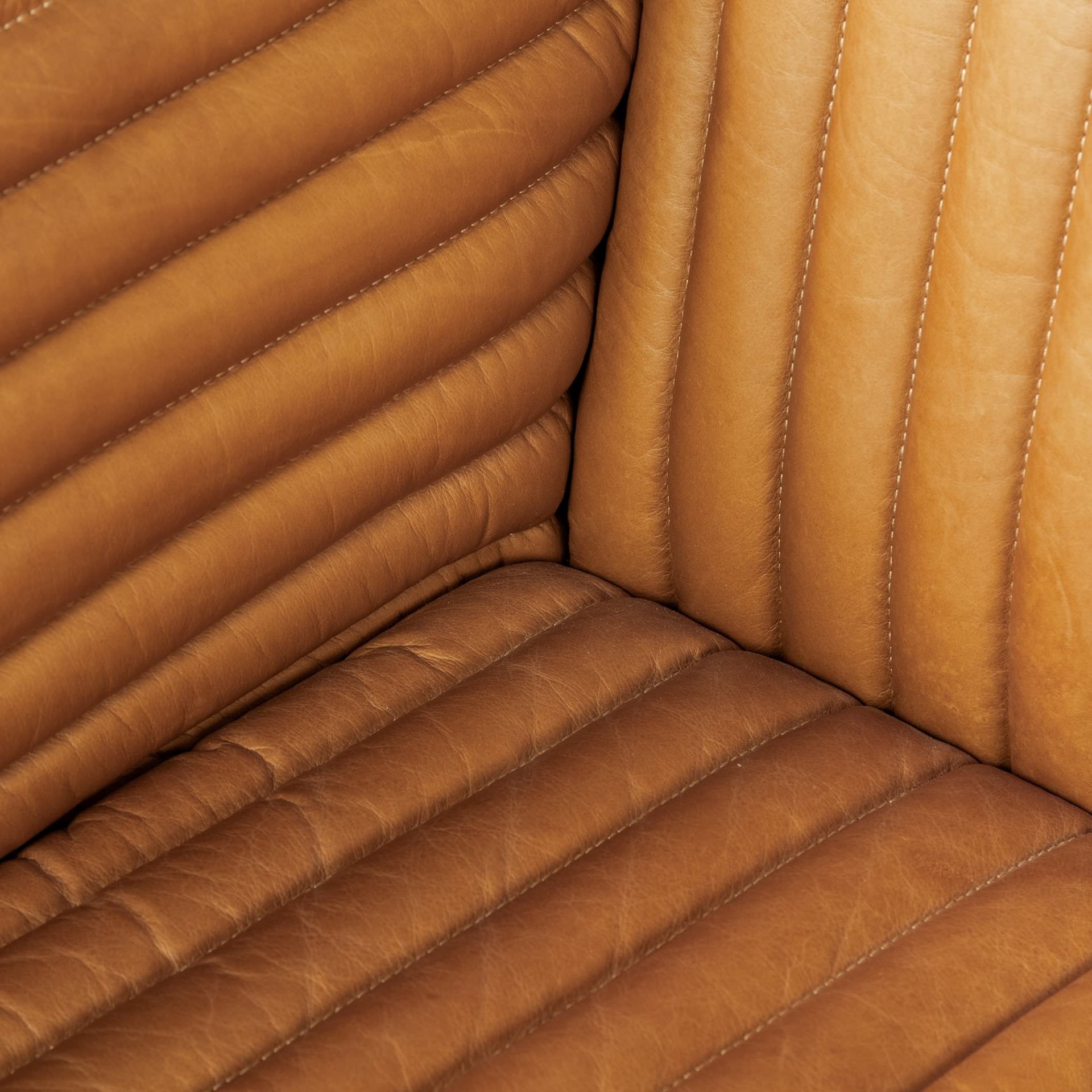 Close up of Ricciardo Cognac Leather Three Seater Sofa 