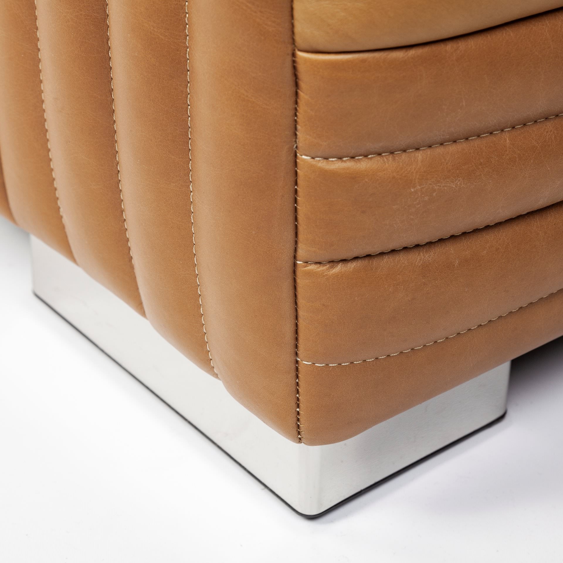 Close up of Ricciardo Cognac Leather Three Seater Sofa on a white background