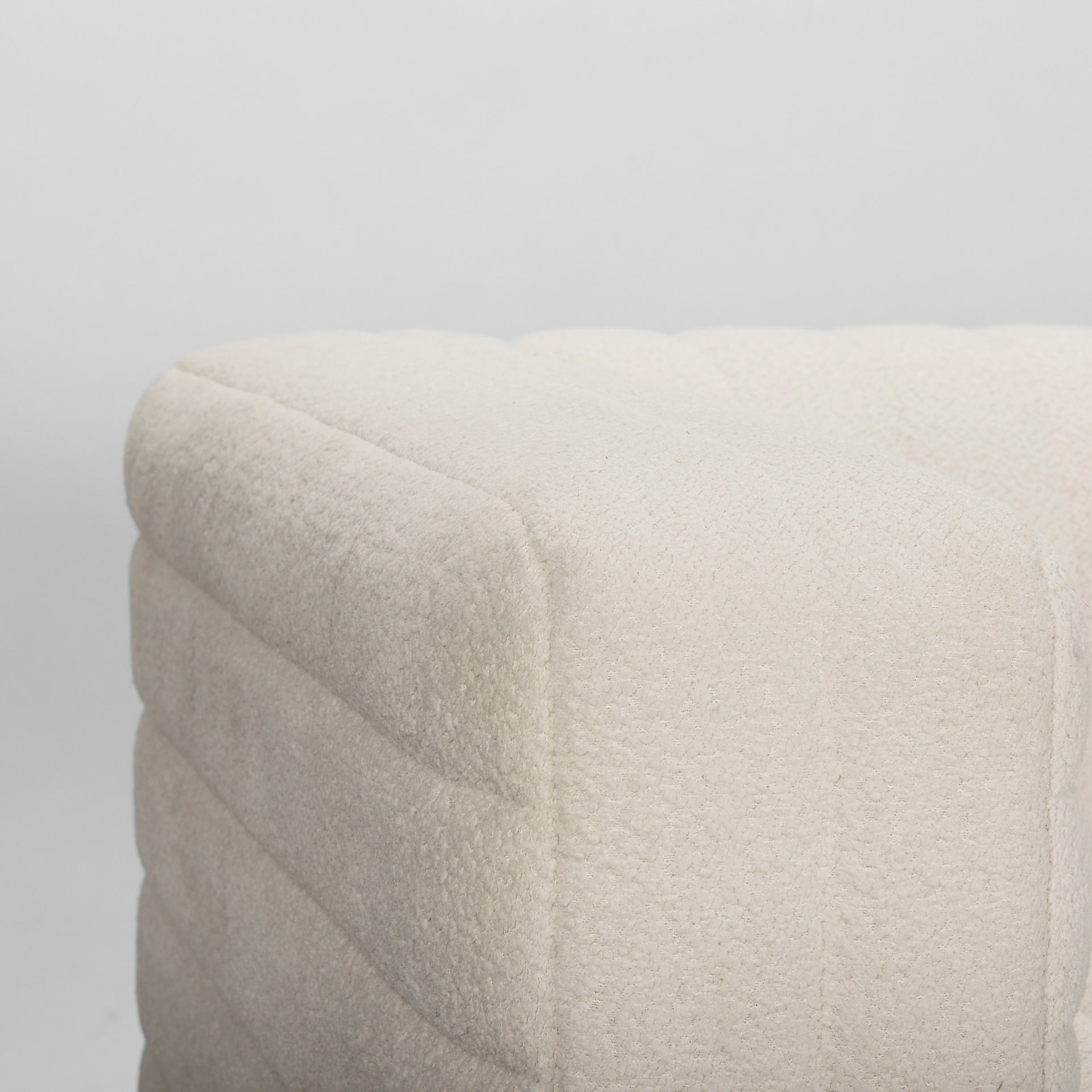 Close up of Ricciardo Cream Boucle 3-Seater Sofa on a white background