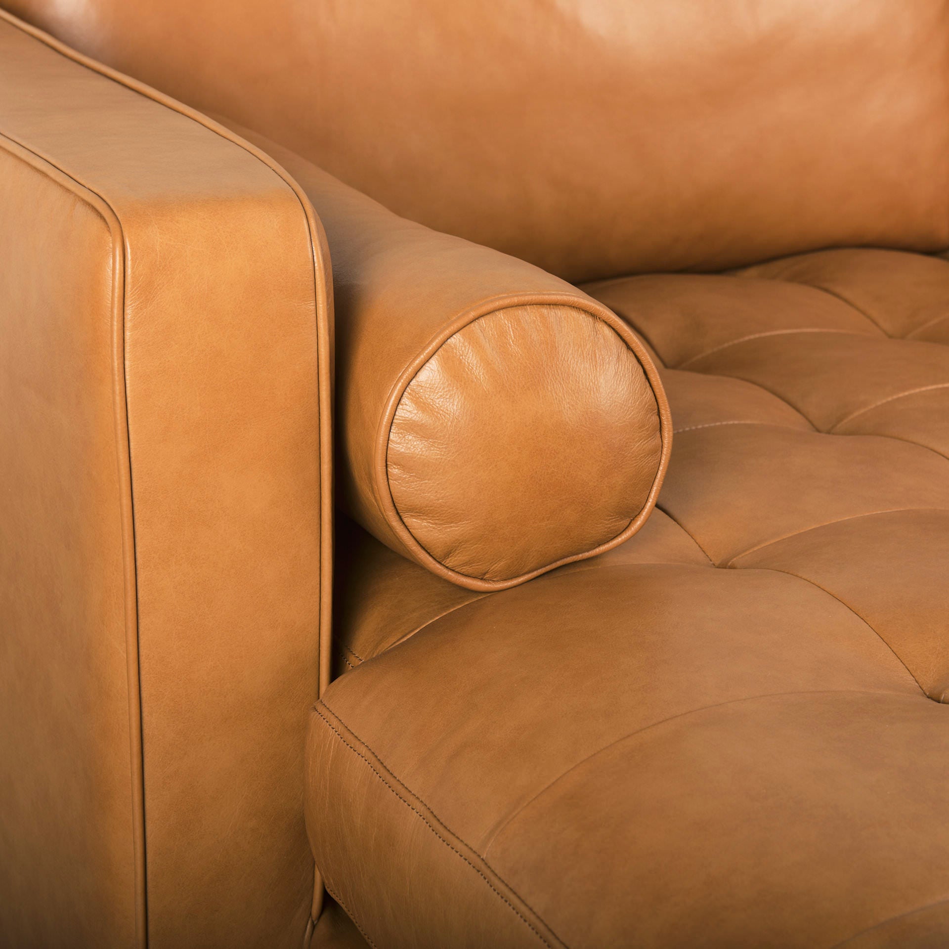 Close up of Svend Tan Leather Left Chaise Sectional Sofa