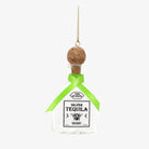 Tequila Ornament with green ribbon like Patron on a white background