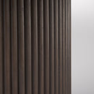 Close up of Terra Dark Brown Wood Round Fluted Dining Table on a white background