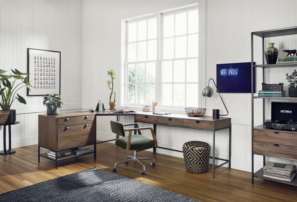 Trey Modular Writing Desk in Auburn Poplar on a white background in an at home office with white walls