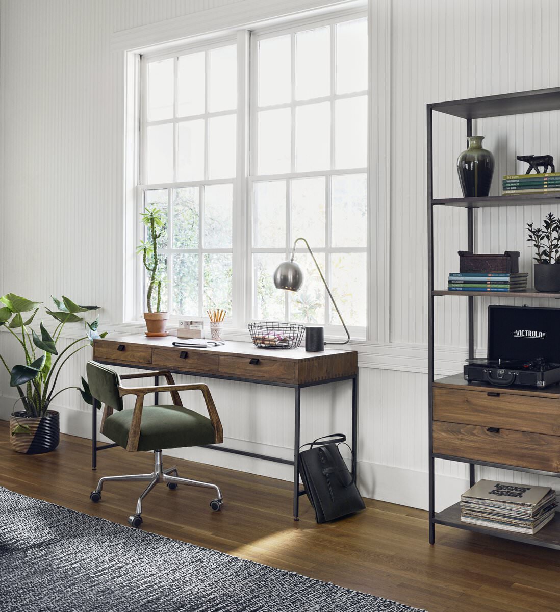 Four Hands Trey Modular Writing Desk in Auburn Poplar in an at home office with white walls