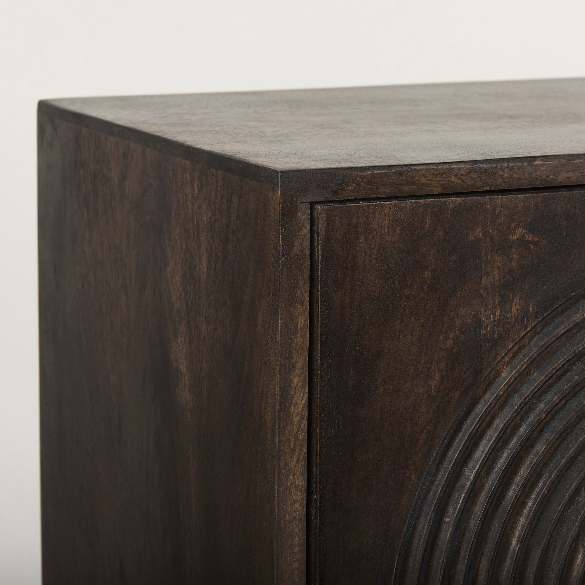 Close up of Tucker Dark Brown w/ Carved Arch Pattern 4 Door Sideboard on a white background