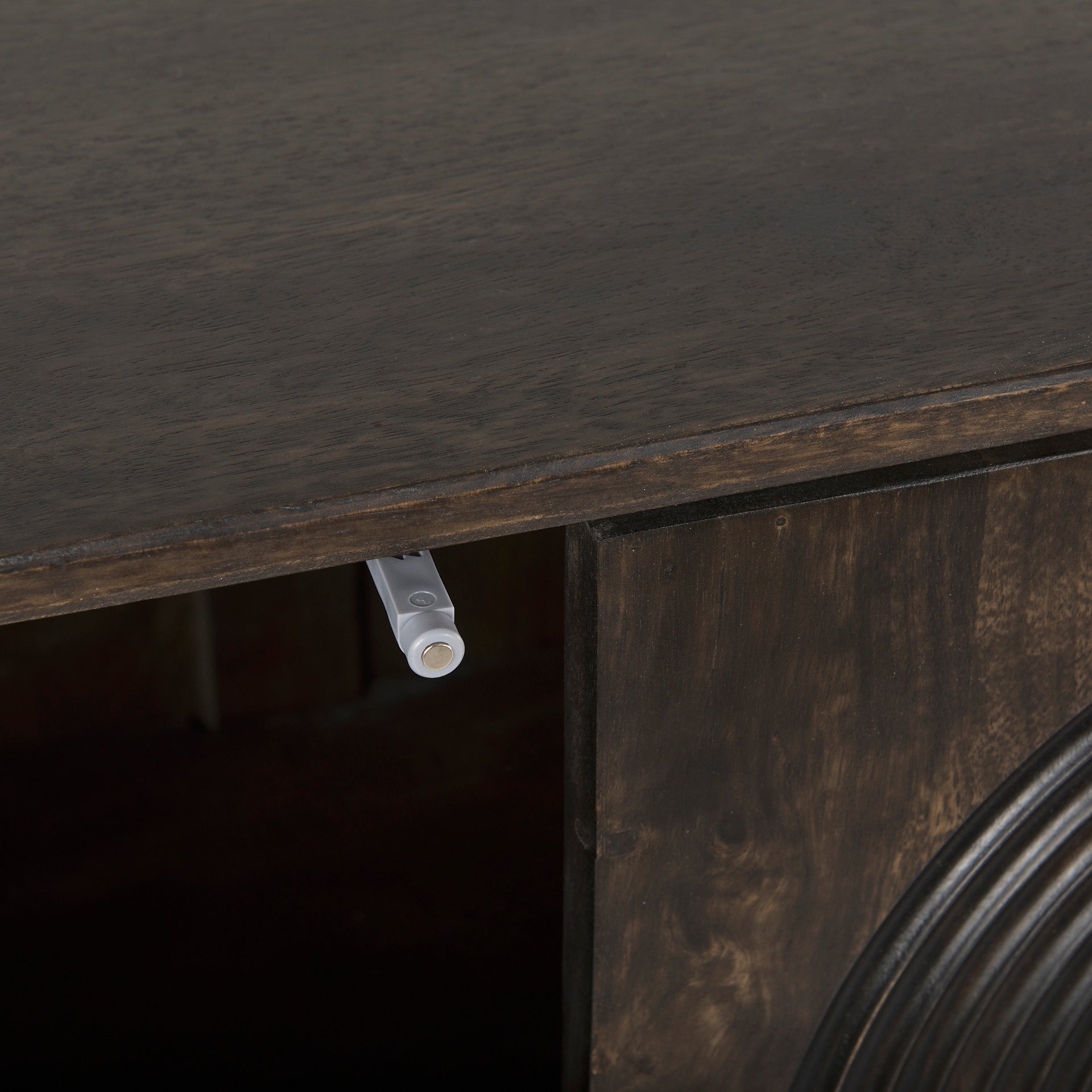 Close up of Tucker Dark Brown w/ Carved Arch Pattern 4 Door Sideboard