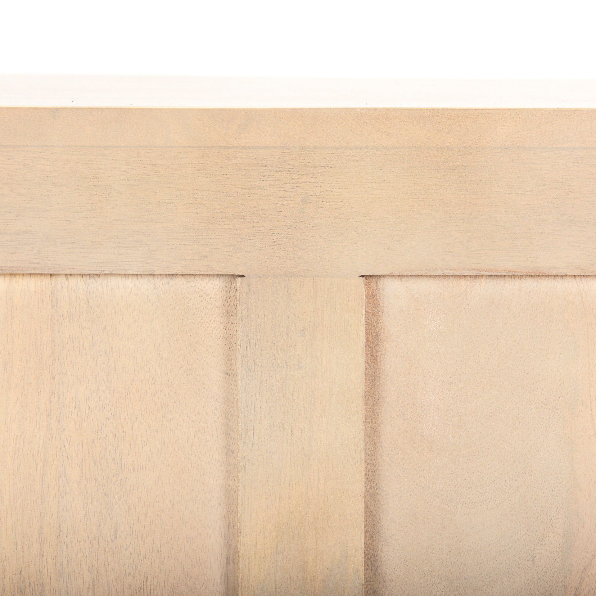 Close up of the back of Tucker Light Brown Wood w/ Carved Arch Pattern 4 Door Sideboard on a white background