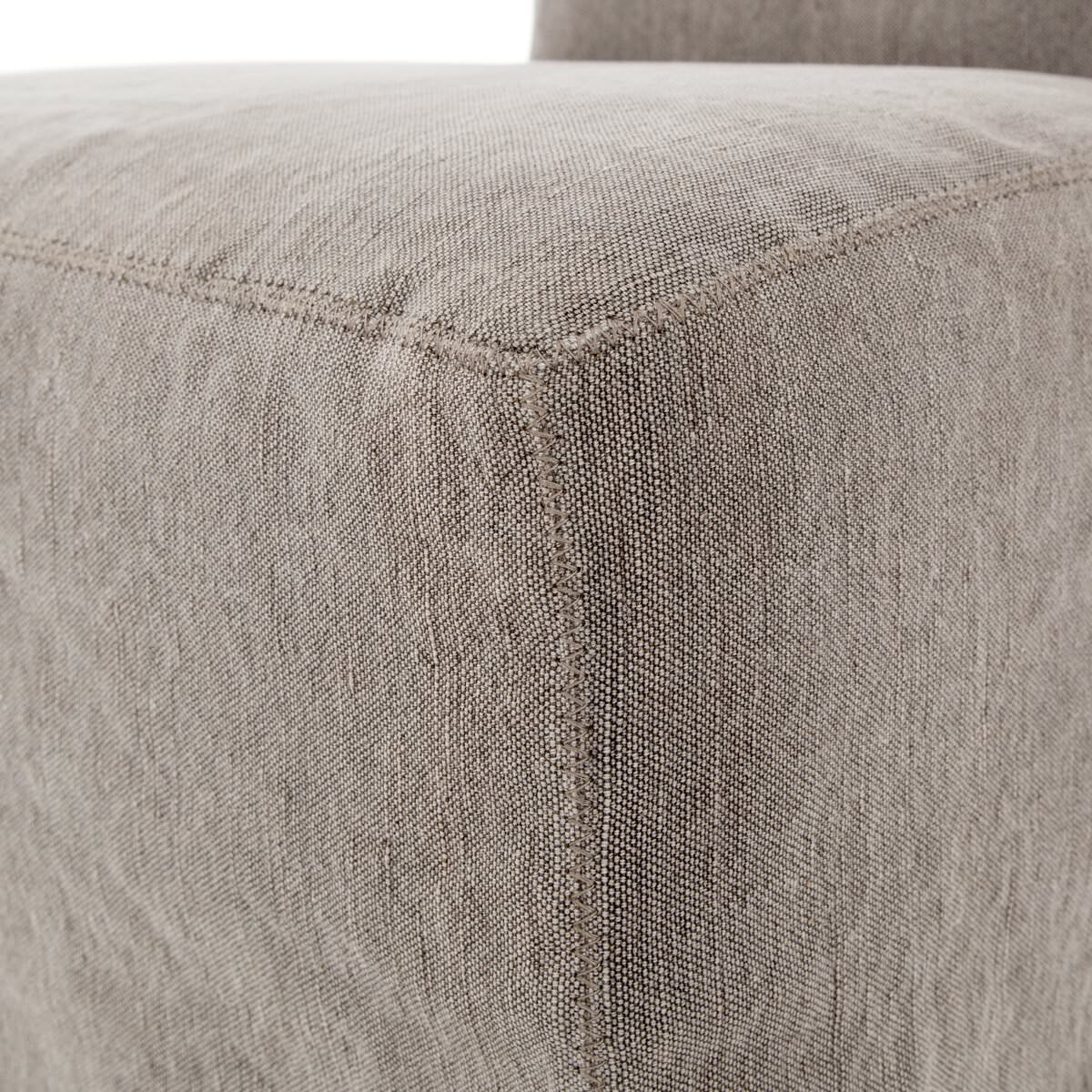 Close up of Vista Slipcovered Dining Chair in Heather Twill Carbon on a white background