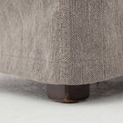 Close up of Vista Slipcovered Dining Chair in Heather Twill Carbon on a white background