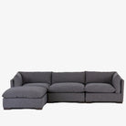 Four Hands Westwood 3-Piece Sectional With Ottoman in Bennett Charcoal on a white background