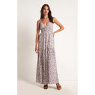 Model wearing Z Supply Lisbon Floral Maxi Dress in Sandstone in front of a white backdrop 