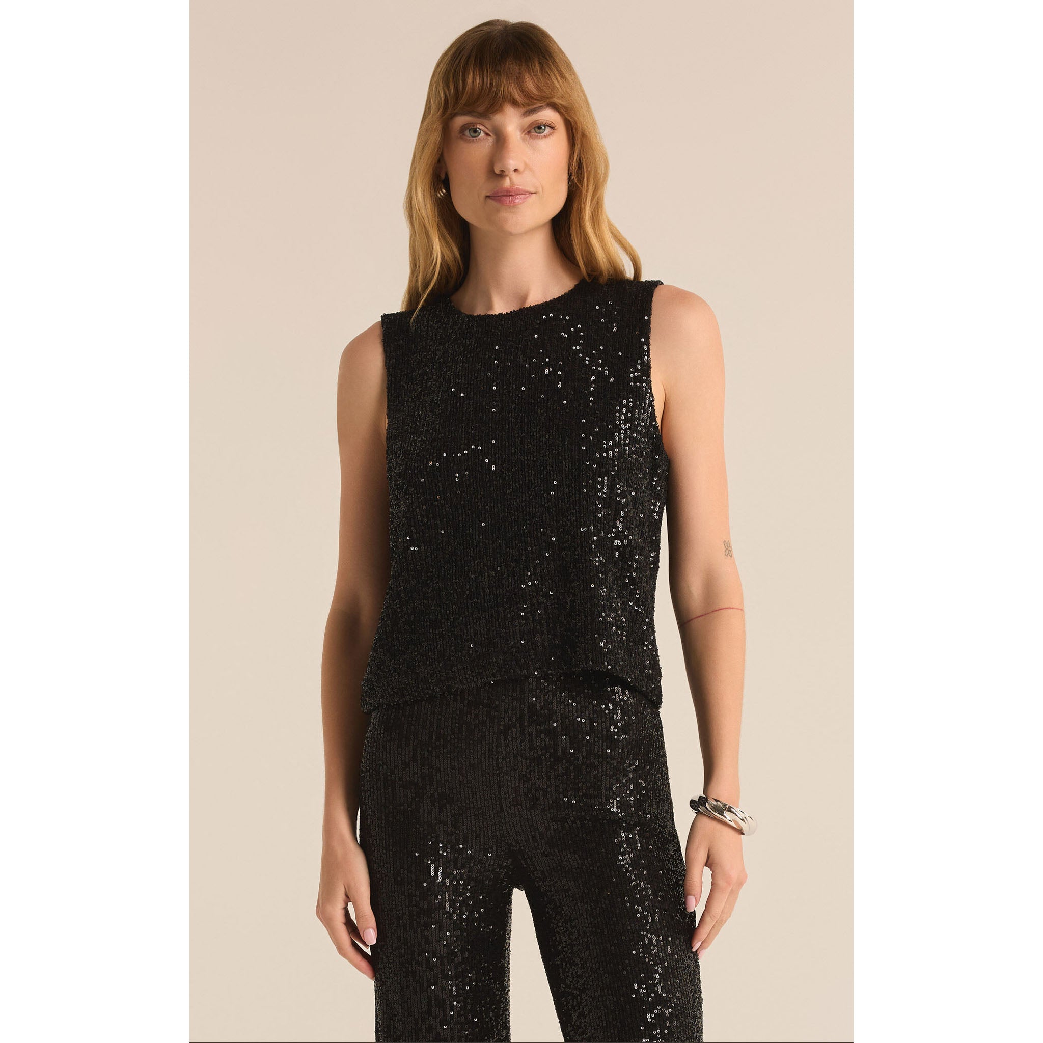 Model wearing Z Supply Sloane Sequin Top in Black in front of a neutral backdrop