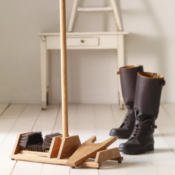 Boot Scraper + Bootjack Stand in a white room at Addison West