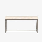 Back view of Four hands brand Trey Modular writing desk with whitewashed wood and three drawers with leather pulls and iron base on a white background