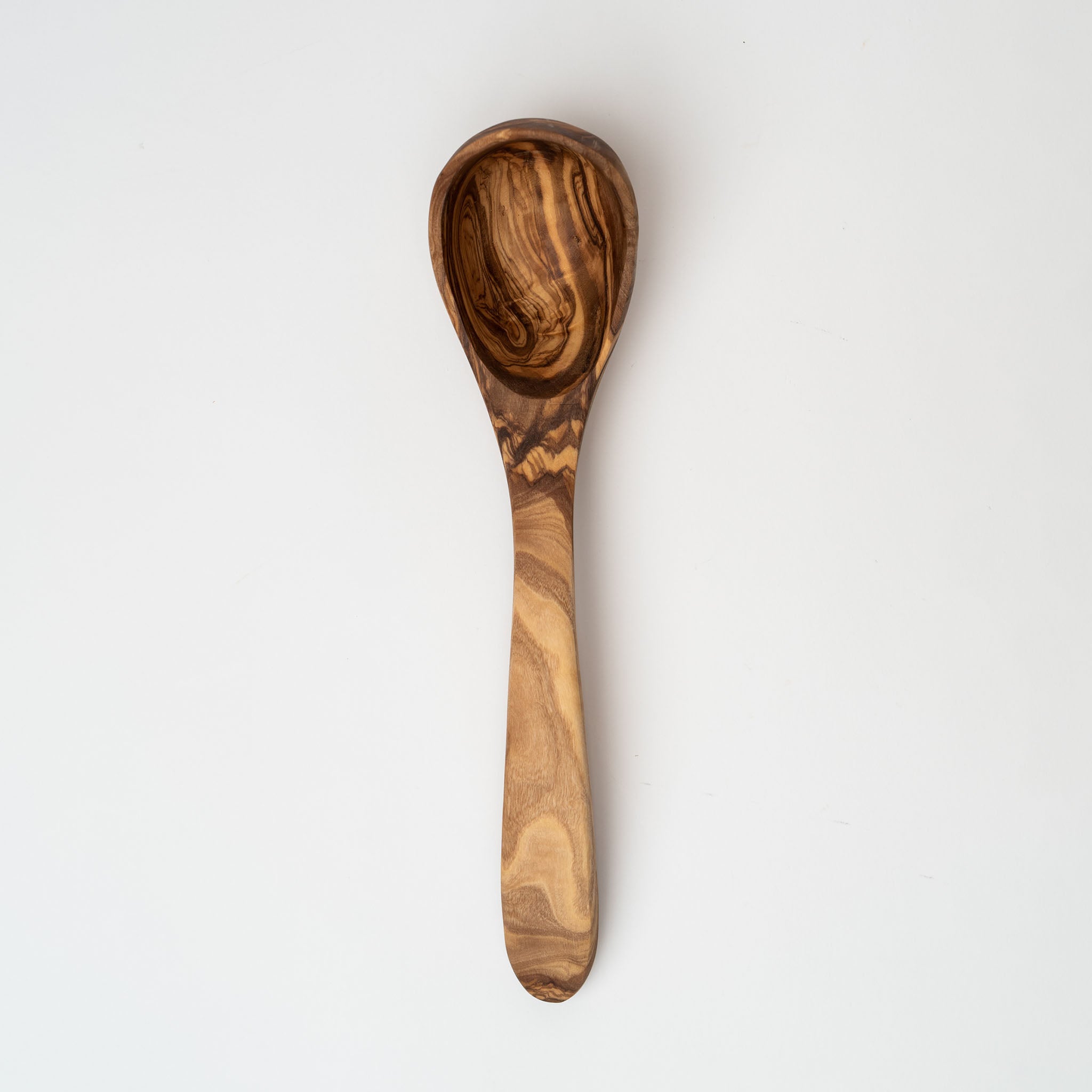 Olive wood ladle on a white background