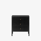 Black three drawer 'Soto' nightstand by four hands furniture on a white background