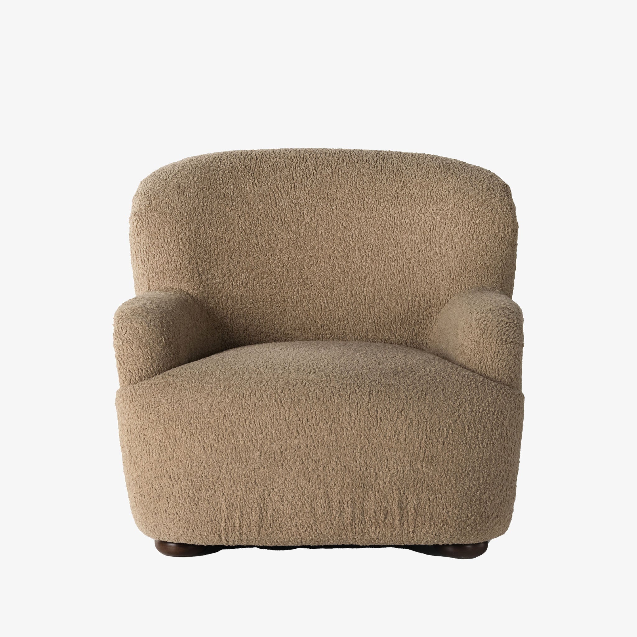 Four hands furniture brand 'Kadon' large armchair with camel color sheepskin style upholstery on a white background