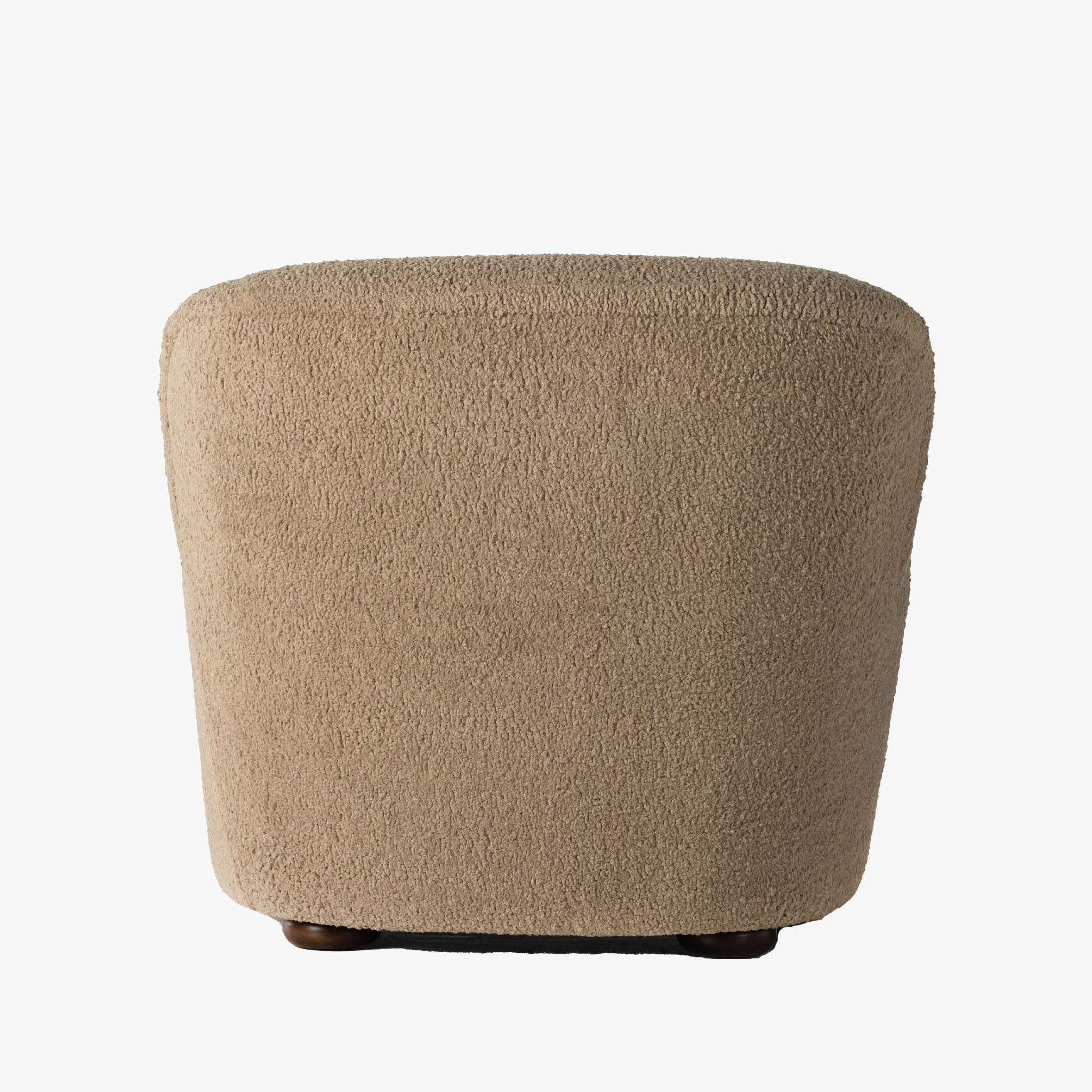 Four hands furniture brand 'Kadon' large armchair with camel color sheepskin style upholstery on a white background