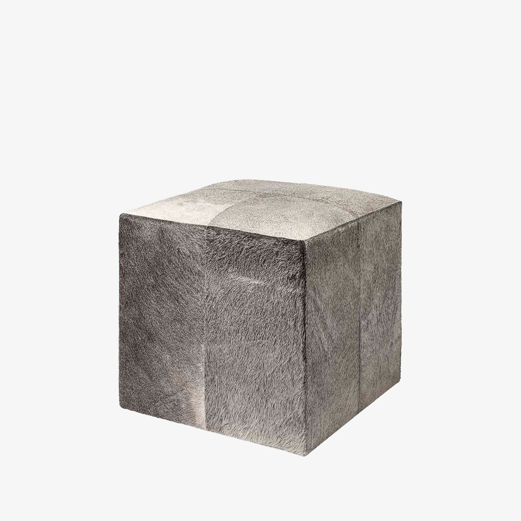 Mercana brand 'Zahavi' 20 inch Grey-toned Square hair on hide ottoman on a white background