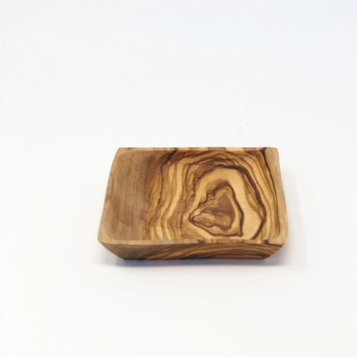 Olive wood square dish on a white background