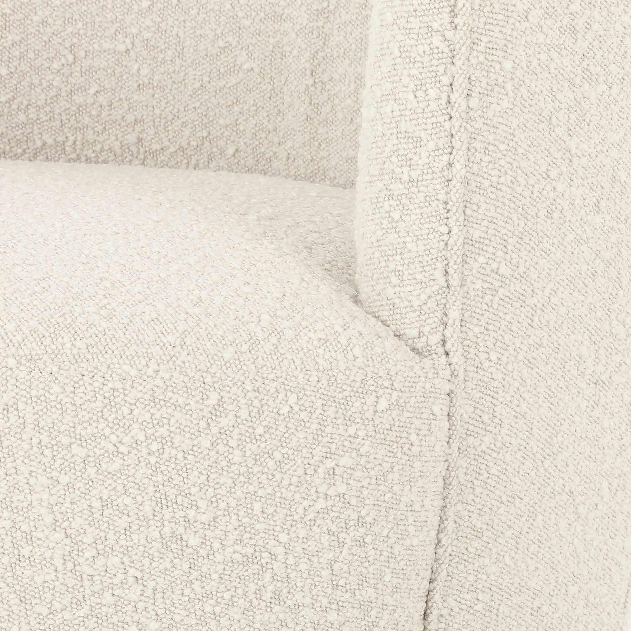 Close up of fabric on Aurora swivel chair in Knoll natural creme color by Four Hands Furniture brand with wood base on a white background