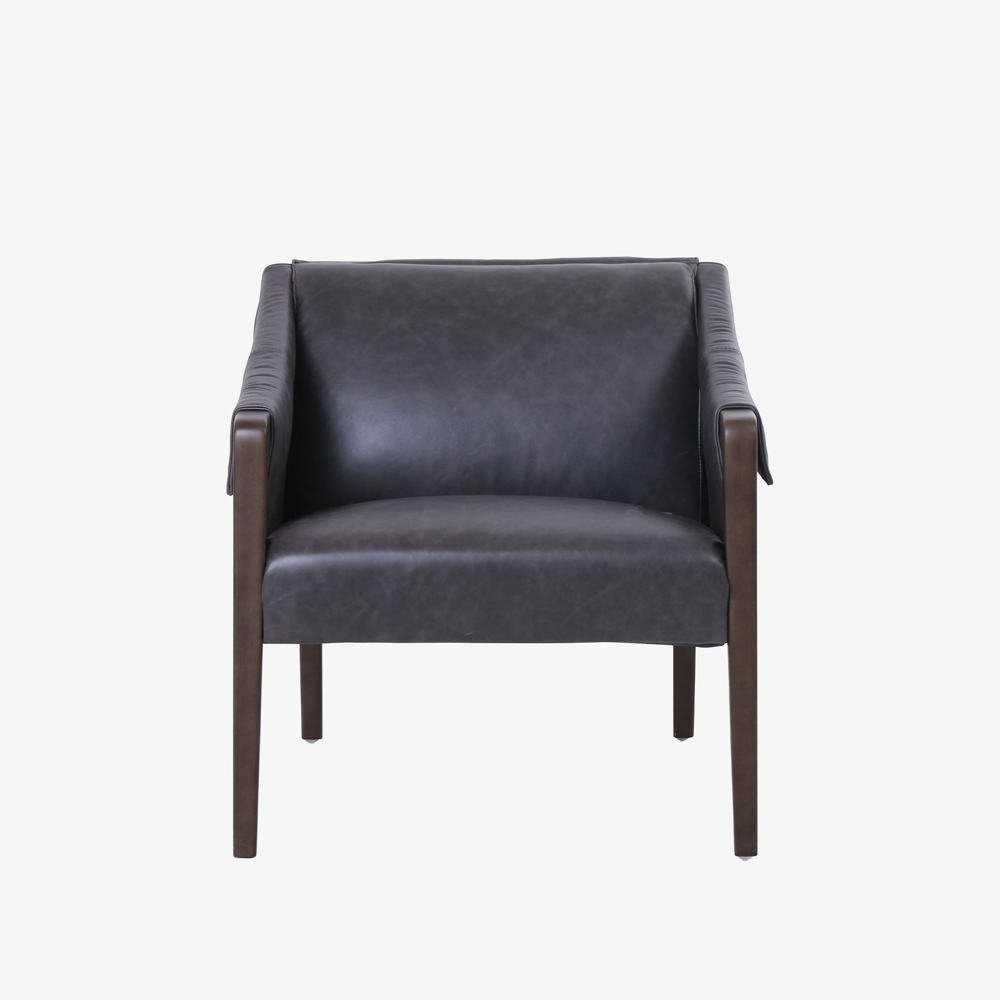 Four Hands Furniture brand Bauer chair in chaps ebony with stained wood legs and leather buckled straps on a white background