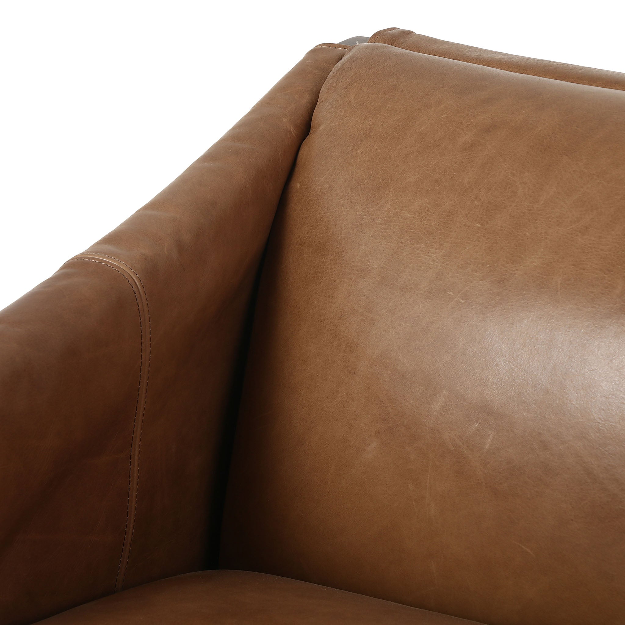 Four Hands Furniture brand Bauer chair in taupe leather with stained wood legs and leather buckled straps on a white background