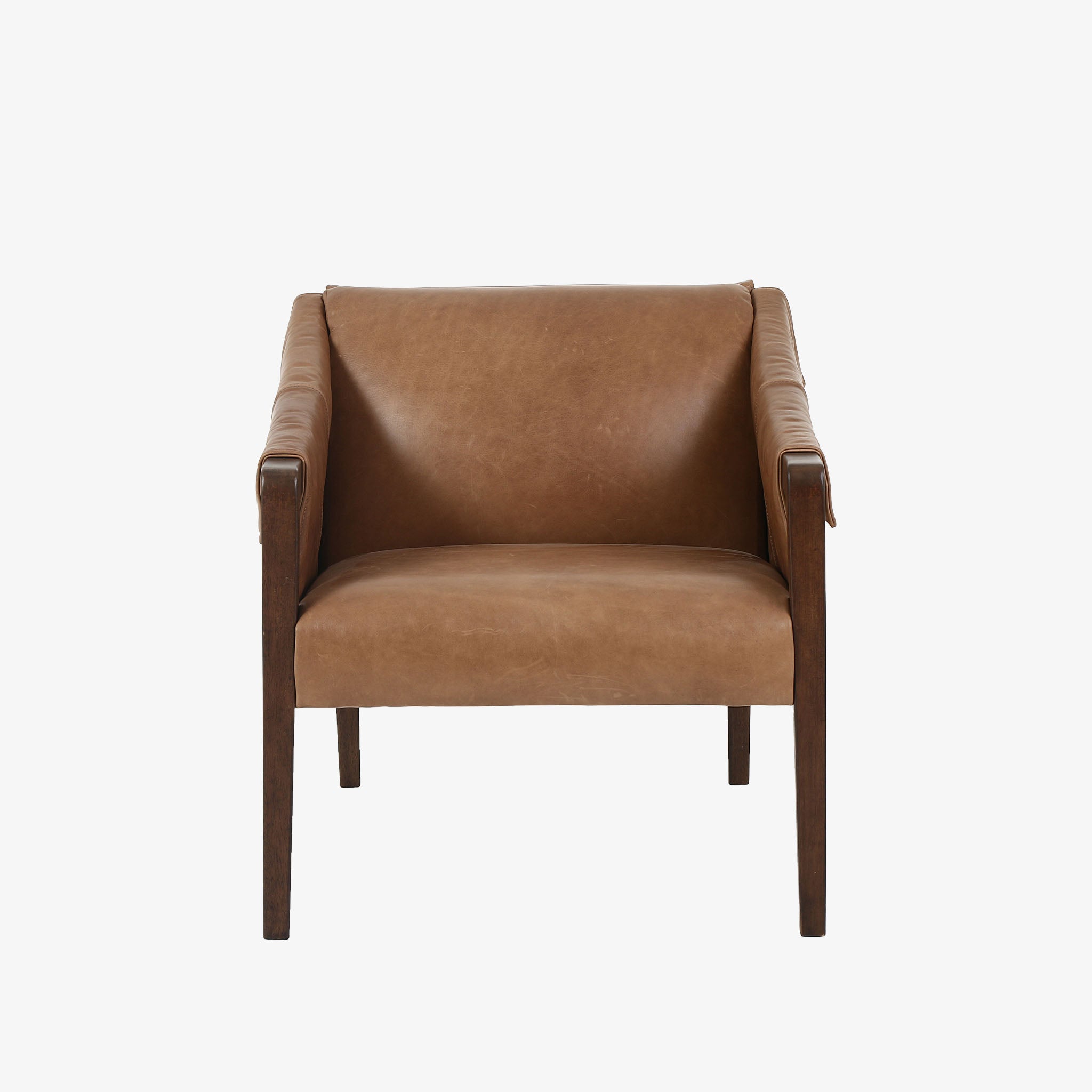 Four Hands Furniture brand Bauer chair in taupe leather with stained wood legs and leather buckled straps on a white background