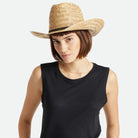 Model wearing Brixton Houston Cowboy Hat in Natural with a black tank top on a white background