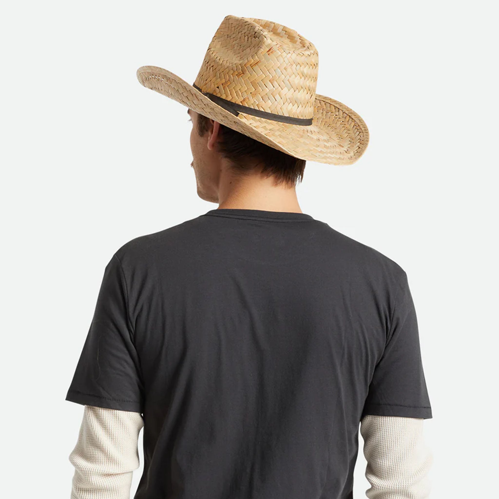 Male Model wearing Brixton Houston Cowboy Hat in Natural with a black t shirt on a white background