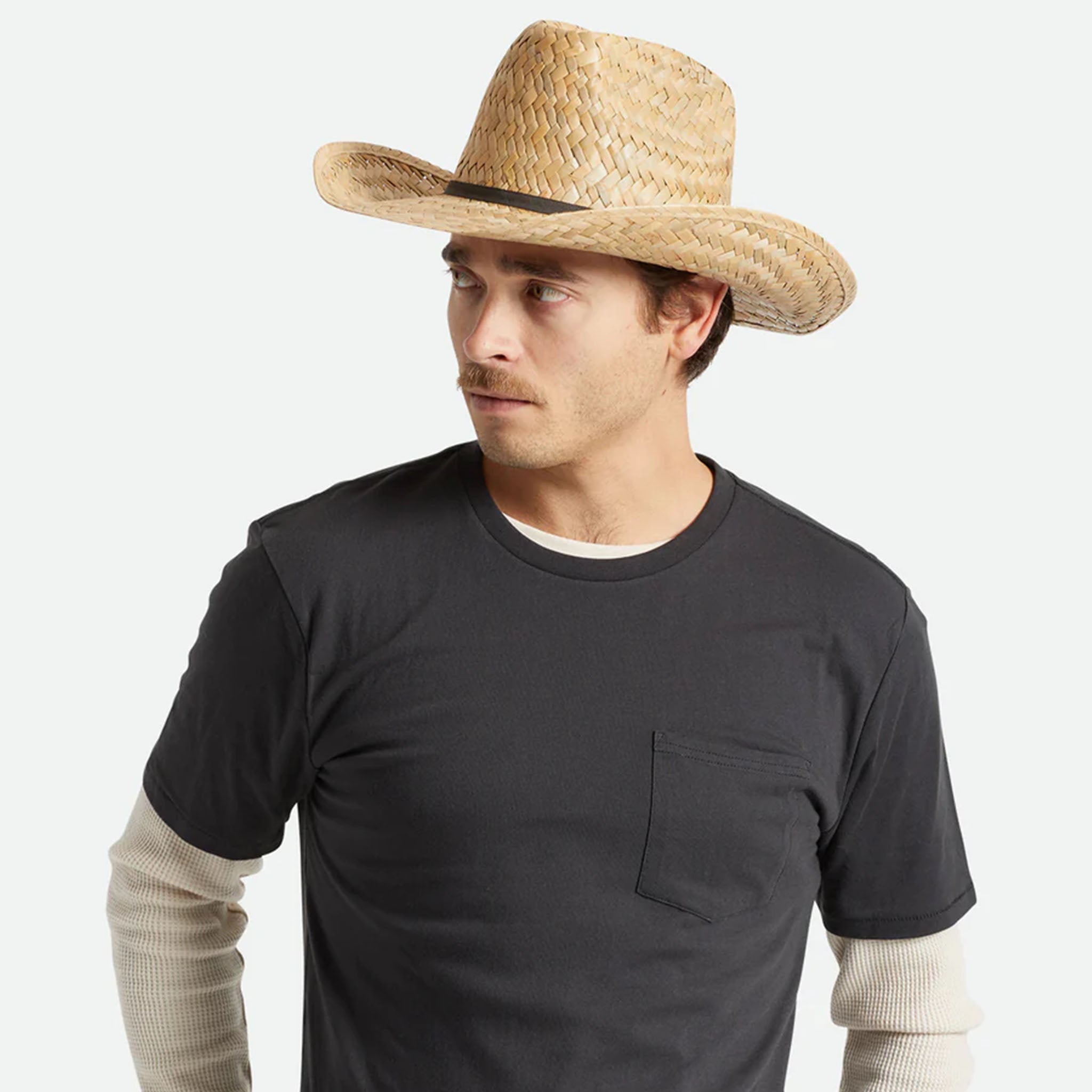 Male Model wearing Brixton Houston Cowboy Hat in Natural with a black t shirt on a white background