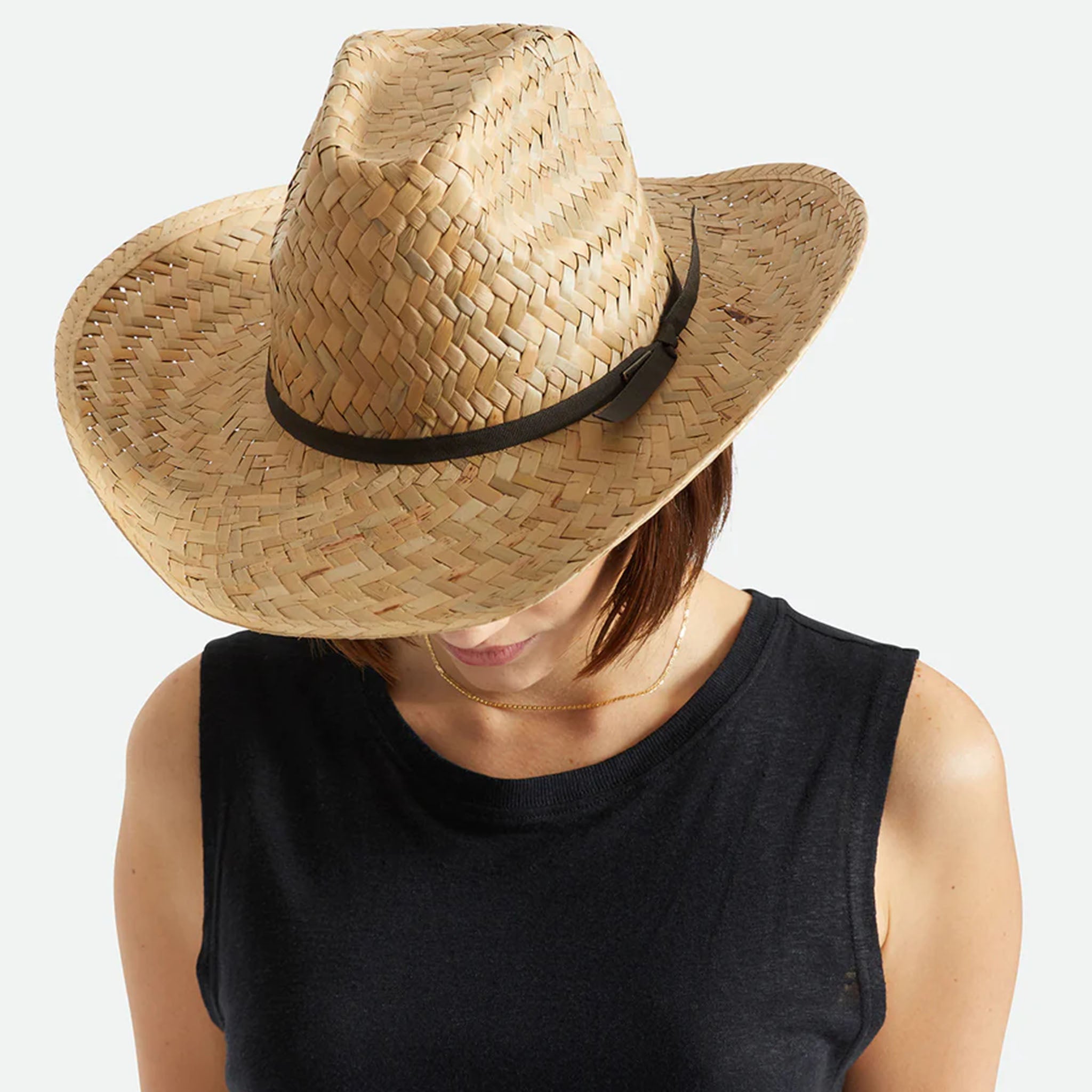 Model wearing Brixton Houston Cowboy Hat in Natural with a black tank top on a white background