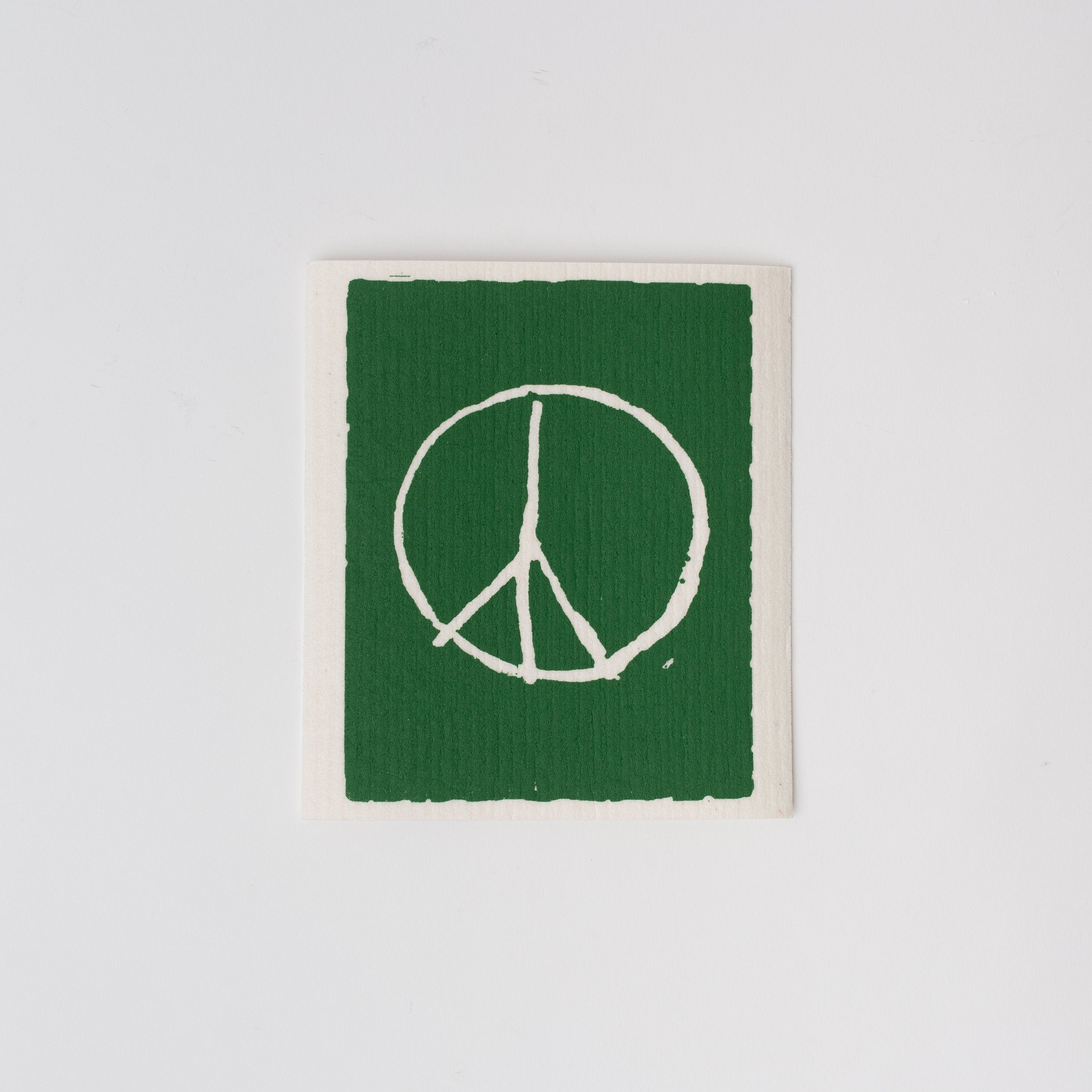 Swedish cloth with Peace sign on green background 