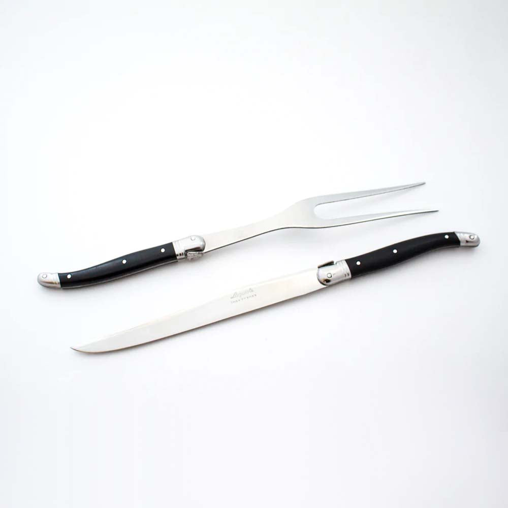 Laguiole ivory carving set on a white background