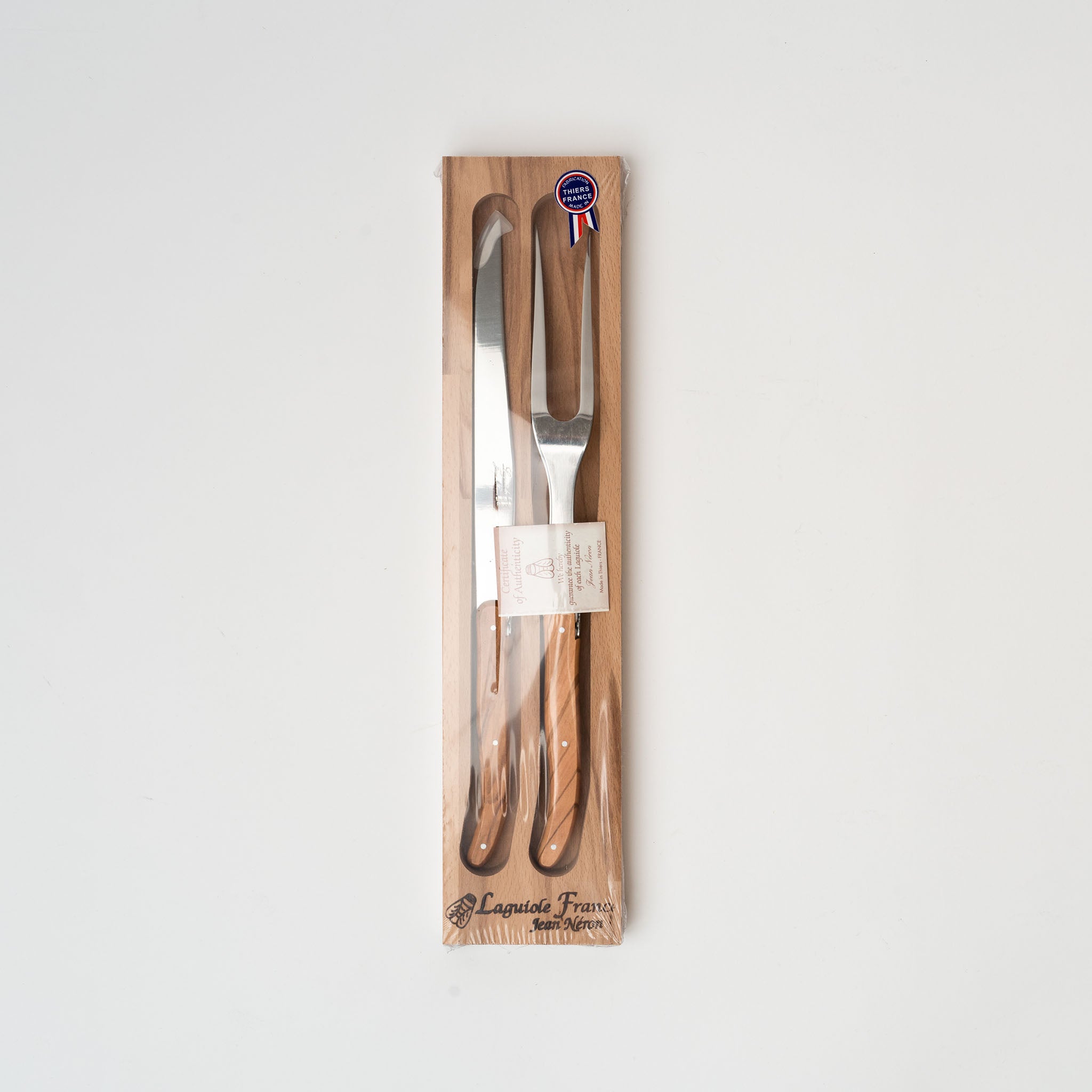 Laguiole carving set with olive wood handle in wood box on a white background