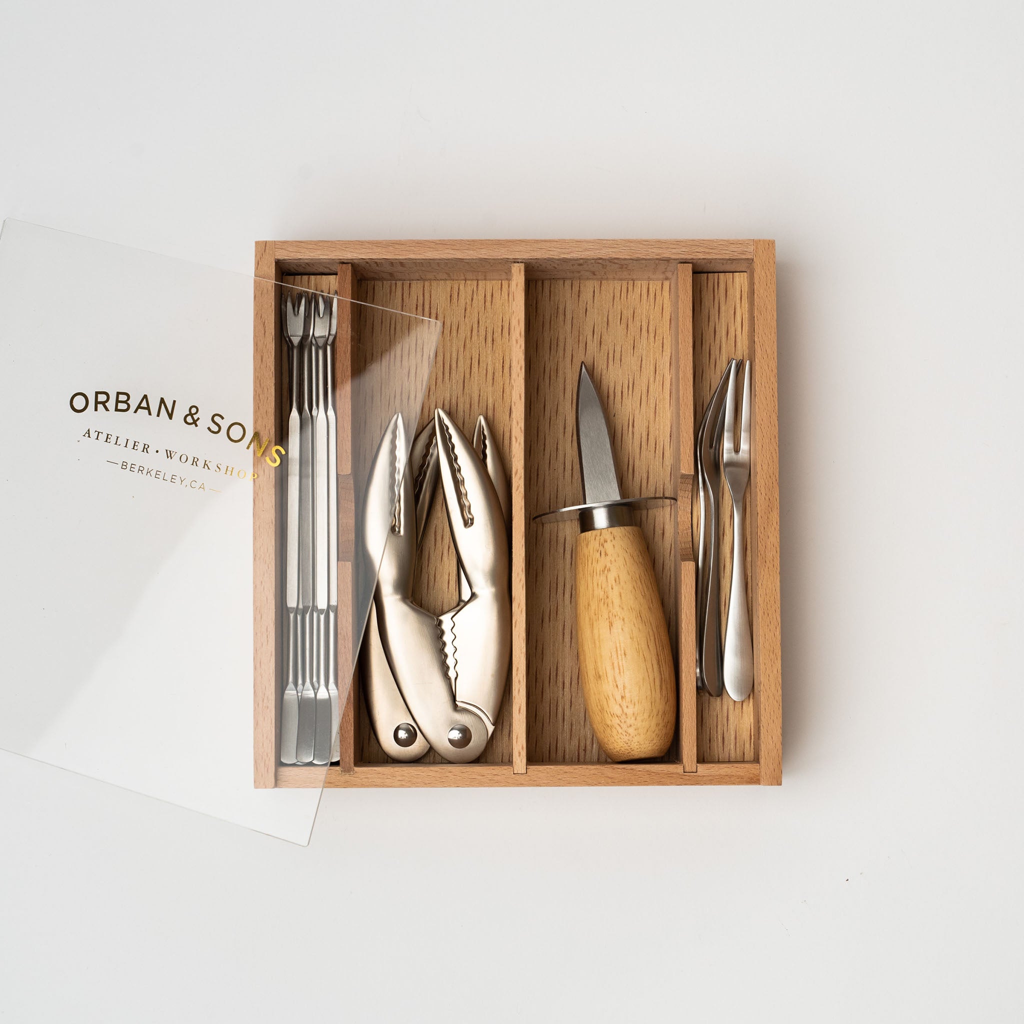 Seafood set in wood box on a white background