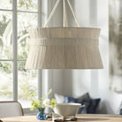 Palacek cassidy chandelier over wood table in kitchen area