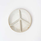 White peace sign trinket dish on a white background