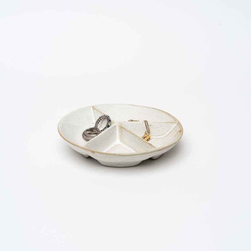 White peace sign trinket dish on a white background