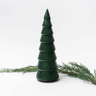 Large Green ceramic decorative Christmas tree on white background