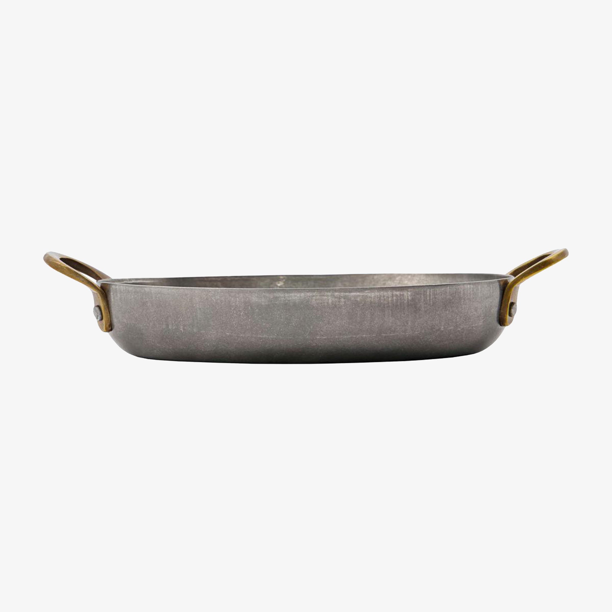 Nicolas Vahé brand metal presentation pan with brass handles on a white background