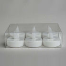 Set Of 6 White LED Tealights in a clear plastic box on a white background