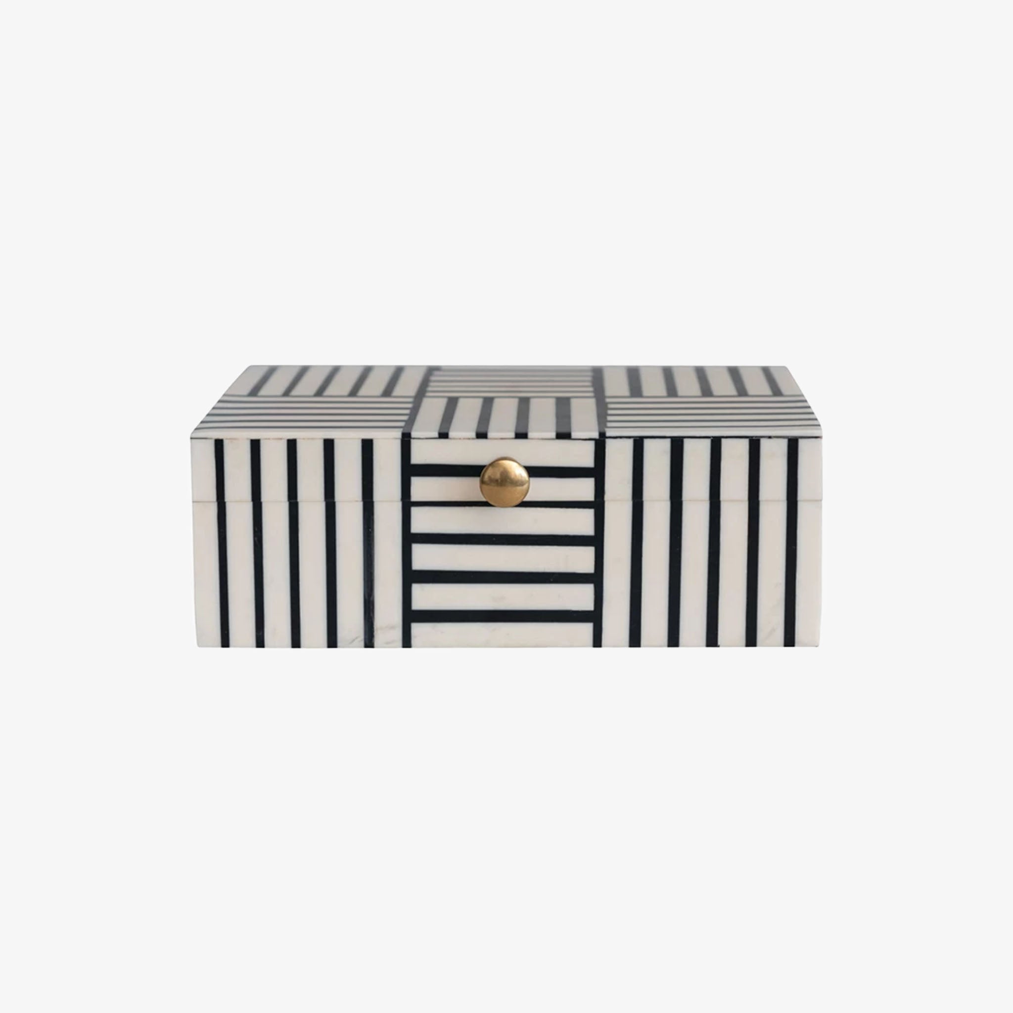 Black and white block stripe box with gold knob on lid on a white background