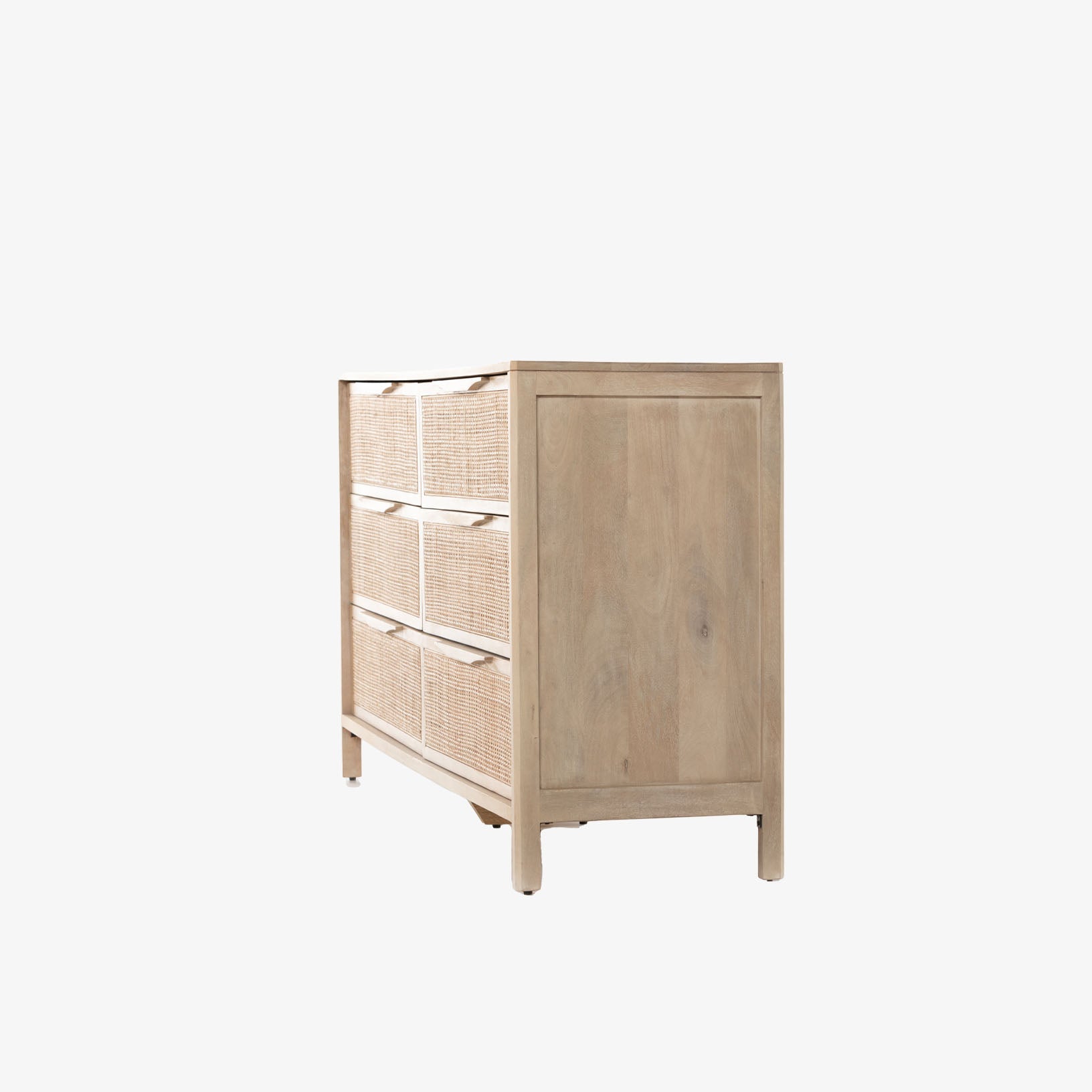 Six drawer 'Sydney' dresser with cane drawer fronts and mango wood pulls with natural mango wood exterior by Four Hands Furniture on a white background