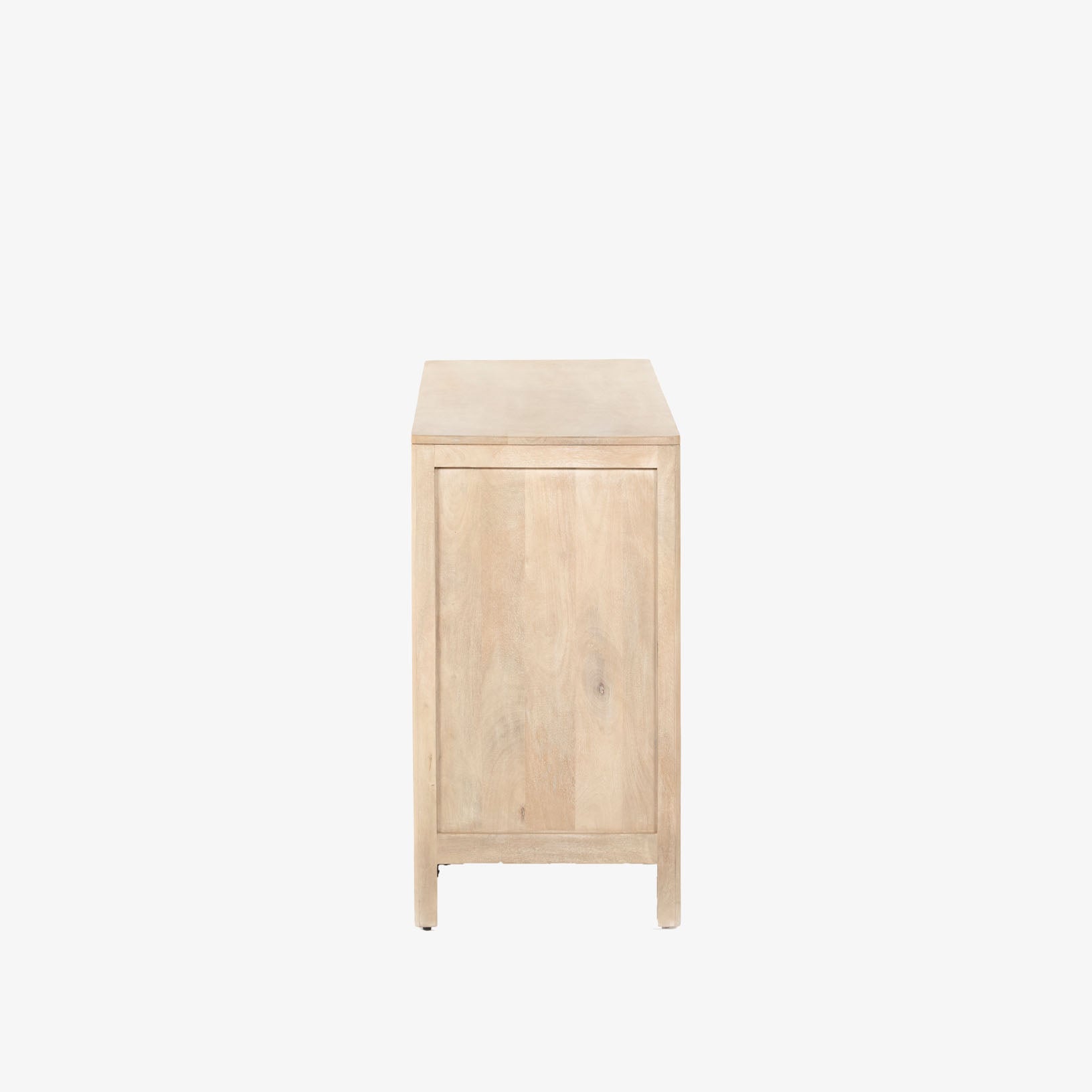 Six drawer 'Sydney' dresser with cane drawer fronts and mango wood pulls with natural mango wood exterior by Four Hands Furniture on a white background