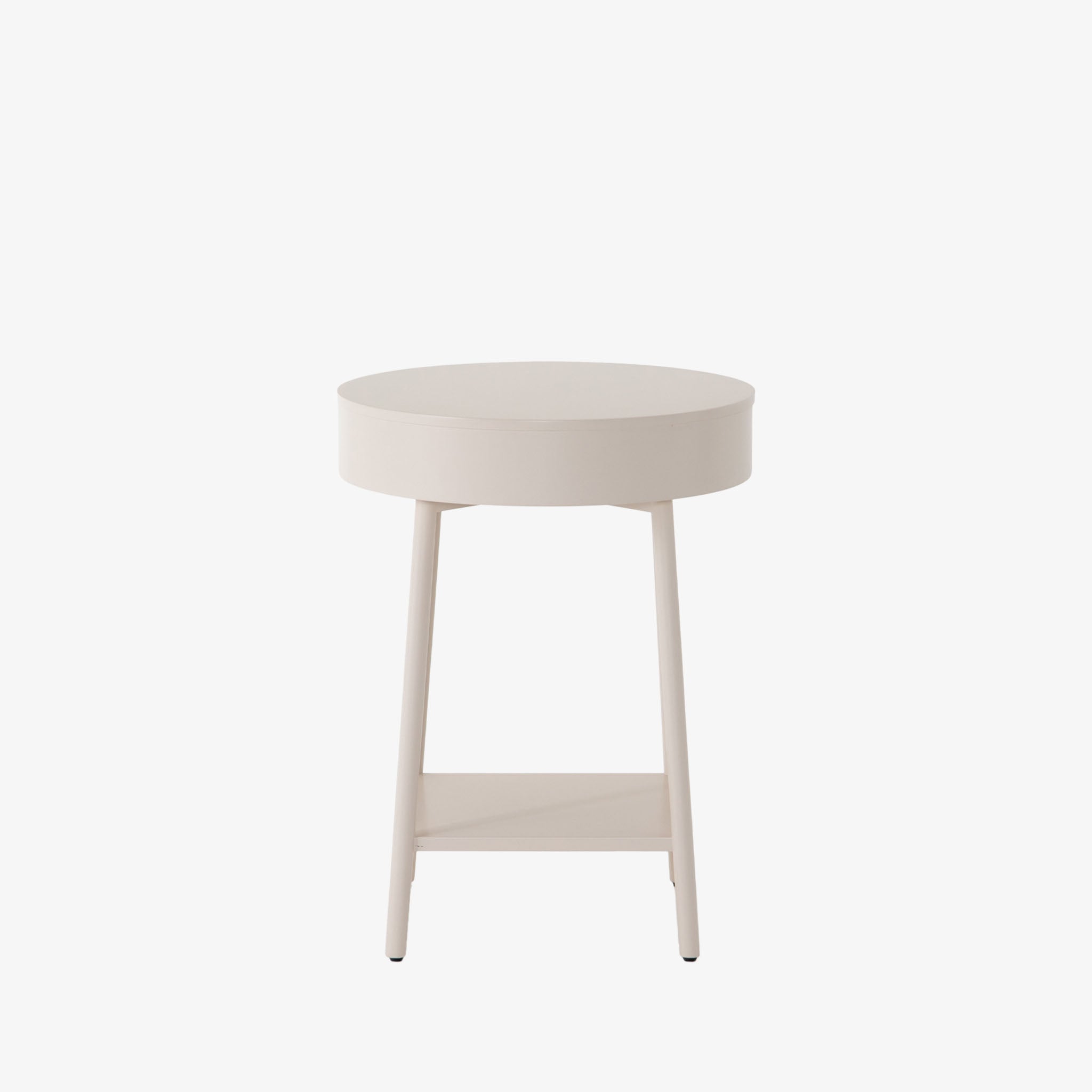 White round 'van' side table with shelf and drawer  by four hands furniture on a white background