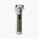 Barebones vintage flashlight in olive on a white background